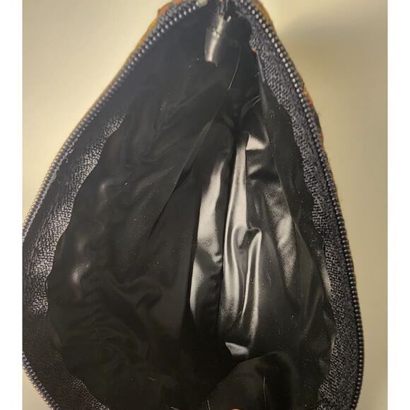 Women's Gold and Black Patterned Accessories Bag with Tassel - Picture 4 of 6